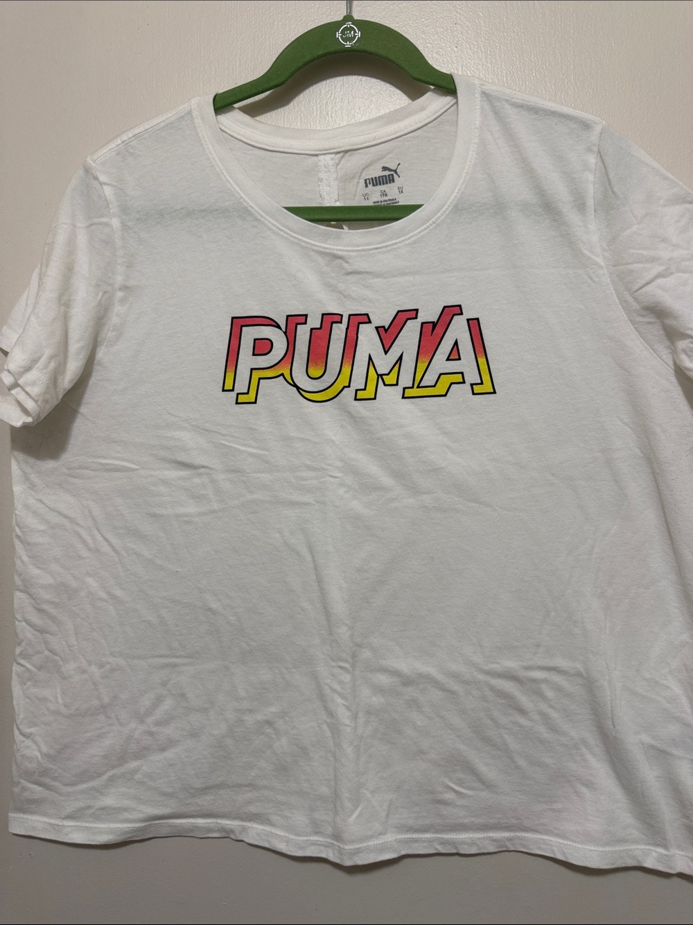 Puma White Short-Sleeve Tee with Coral and Yellow Gradient Logo and Slit in Back